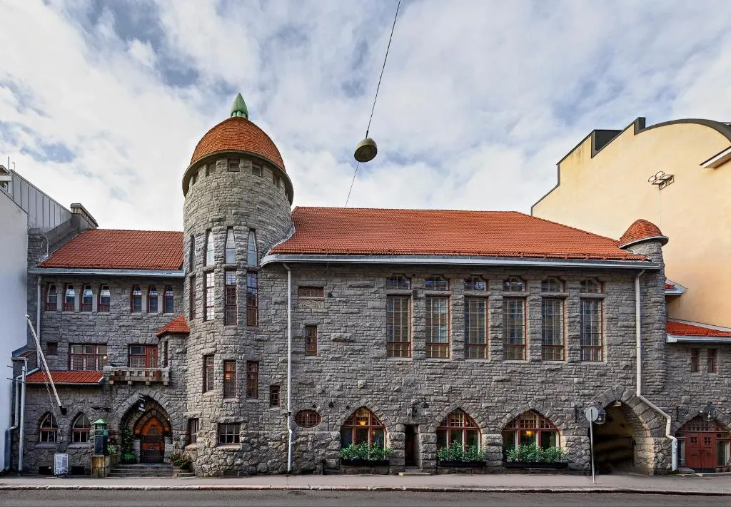 The stone facade of Glo Hotel Art